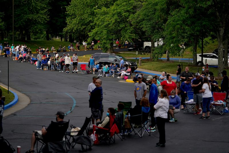 FILE PHOTO: People wait outside Kentucky Career Center in Frankfort