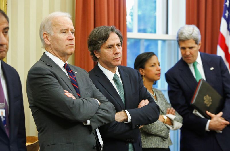 FILE PHOTO: Biden, Blinken, Rice and Kerry listen as Obama and Al-Maliki address reporters after their meeting at the White House in Washington