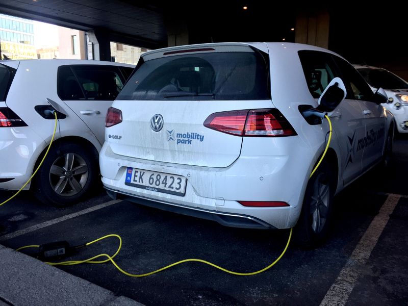 FILE PHOTO: Electric cars are parked in Oslo
