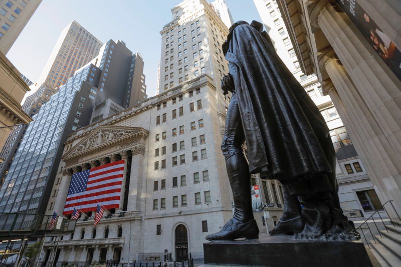 The statue of former U.S. President George Washington stands across the New York Stock Exchange (NYSE) following Election Day in Manhattan, New York City