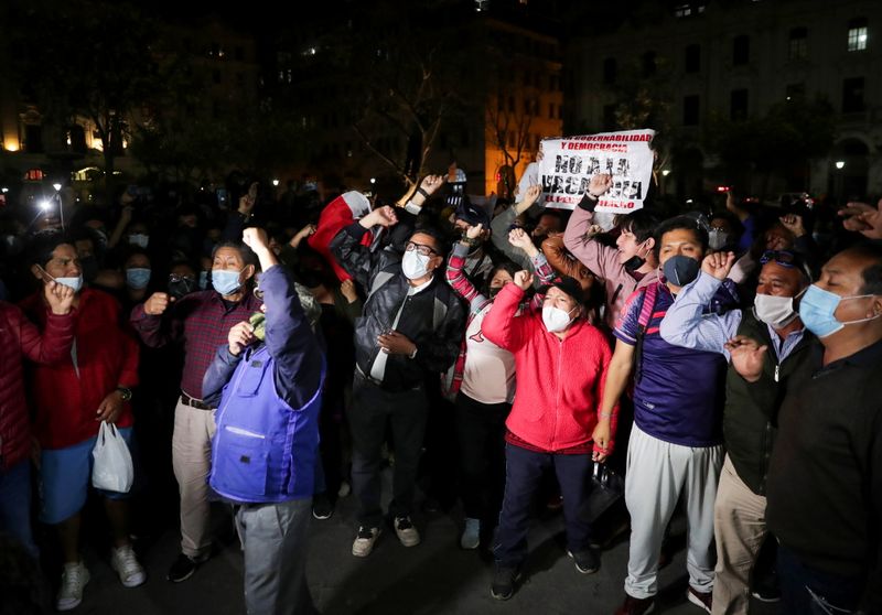 People take to the street to protest against the impeachment of Peru's President Martin Vizcarra after he was ousted by Congress, in Lima