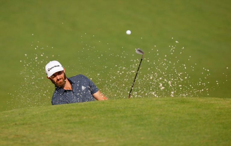 Johnson retains four-shot lead early in final round at Masters