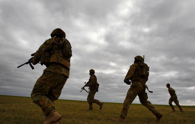 Members of Australia's special forces conduct an exercise during the Australian International Airshow in Melbourne