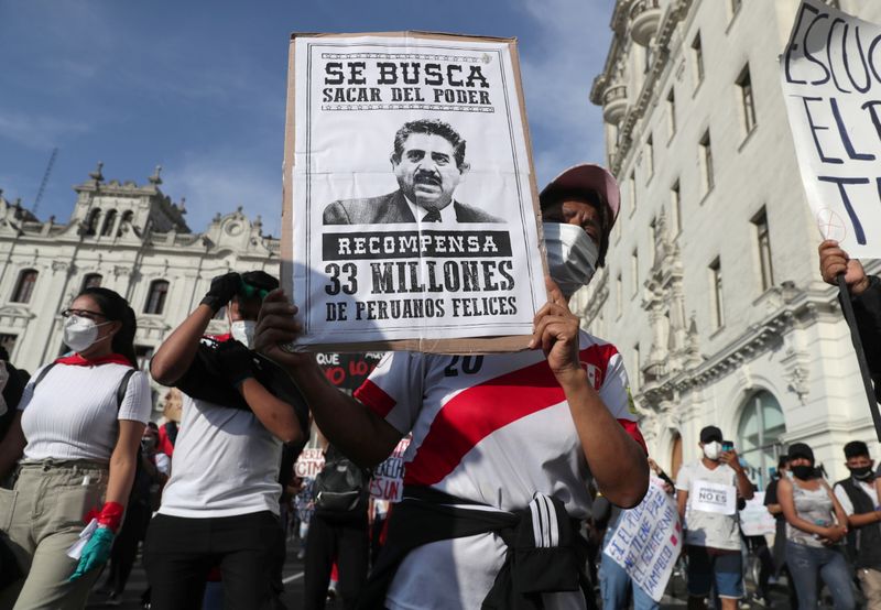 Peruvians protest against the decision of Congress to remove former President Martin Vizcarra, in Lima