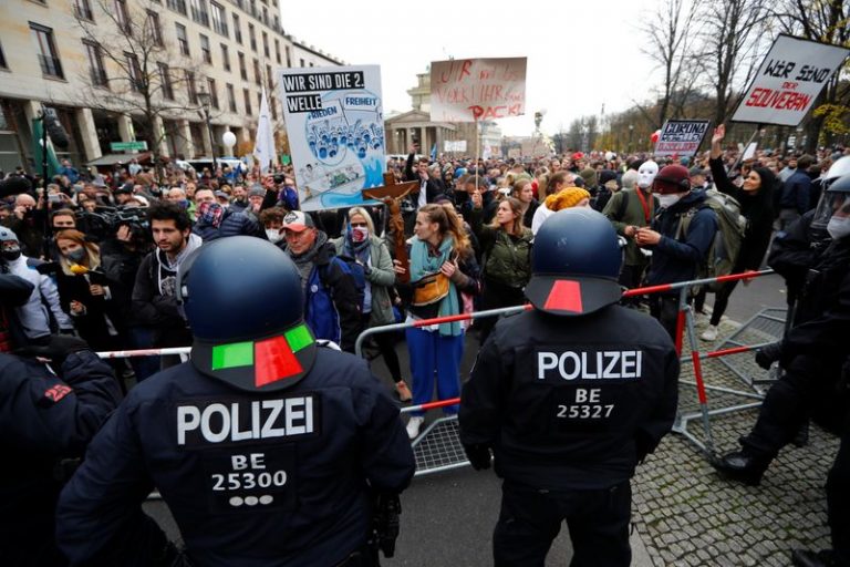 Thousands protest in Berlin against Merkel’s coronavirus plans