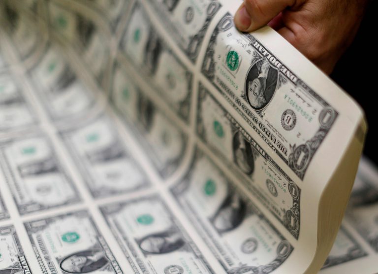 U.S. dollar hovers around two-and-a-half year low; Analysts see further weakness in 2021