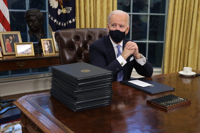 Biden to sign 10 executive orders and invoke Defense Production Act to combat Covid pandemic