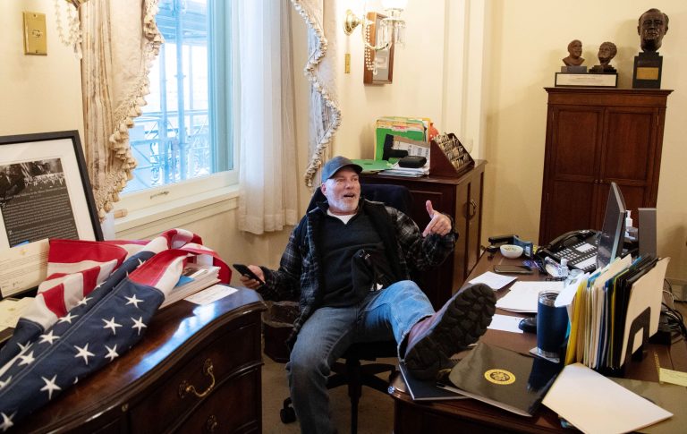 Man photographed with foot on Pelosi’s desk during U.S. Capitol riot arrested