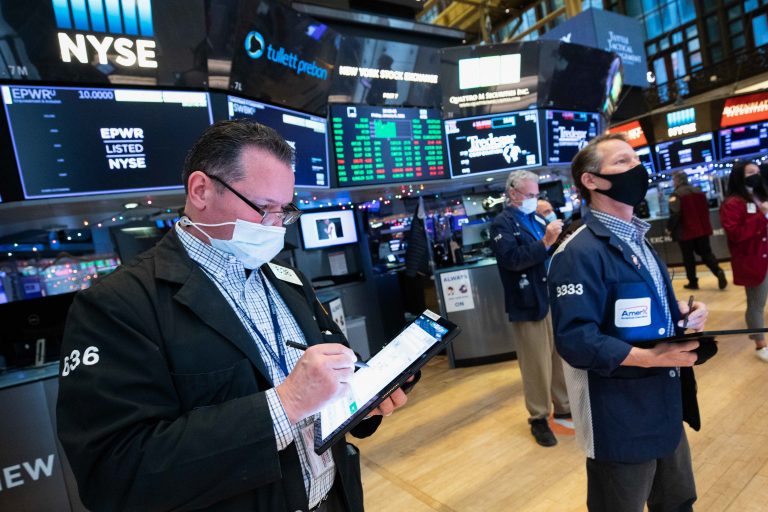 Stock futures are flat after Wall Street closed at record highs to end last week