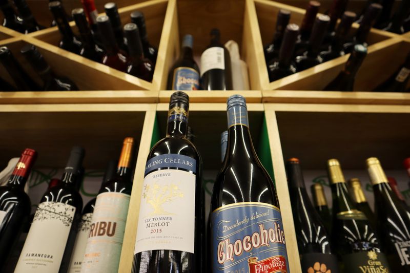 Bottles of South African wine are displayed among others at a supermarket in Beijing