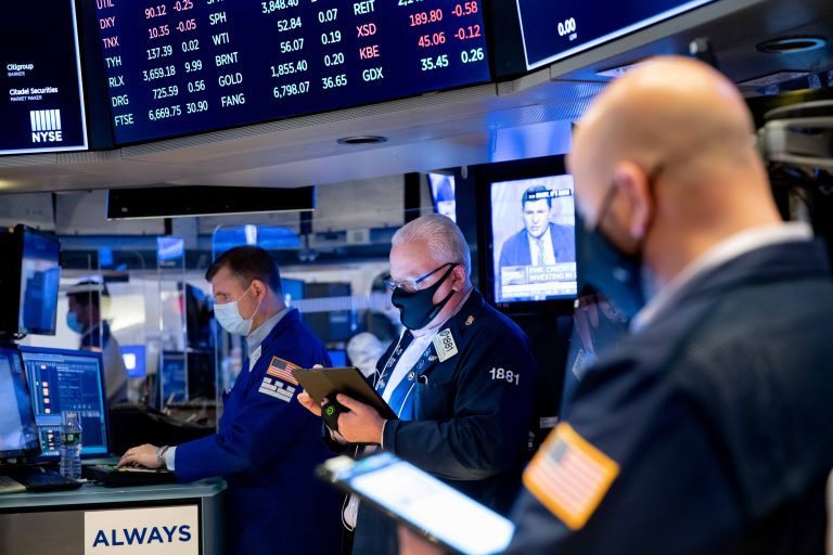Dow jumps 200 points to a record high as rally continues
