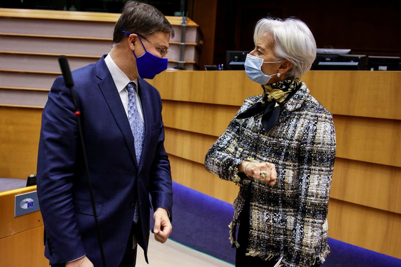 EC's Dombrovskis (L) greets ECB's Lagarde in Brussels