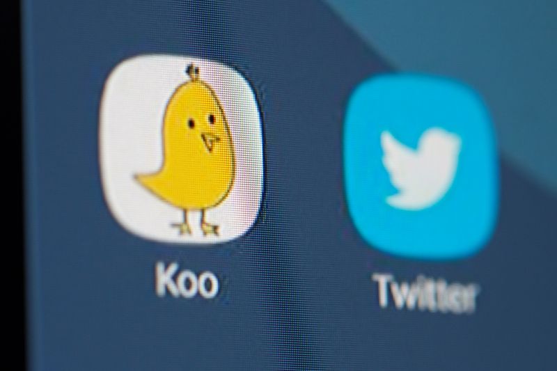 Twitter and Koo app logos are seen on smartphone in this illustration taken