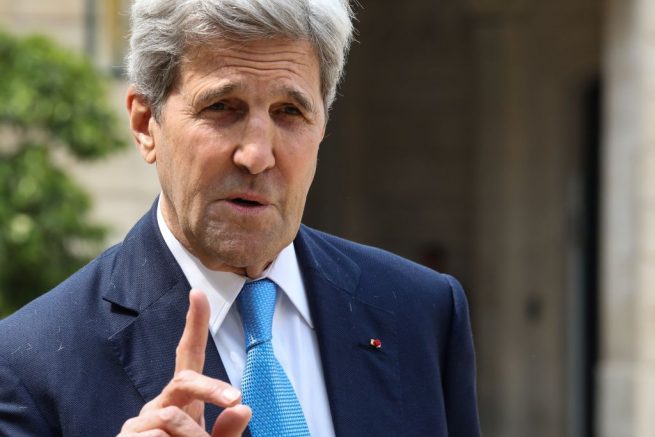 US former Secretary of State and member of the Carnegie foundation John Kerry gestures as speaks to the press while leaving the Elysee Palace in Paris, on May 23, 2018 after the "Tech for Good" summit. (Photo by ludovic MARIN / AFP) (Photo by LUDOVIC MARIN/AFP via Getty Images)