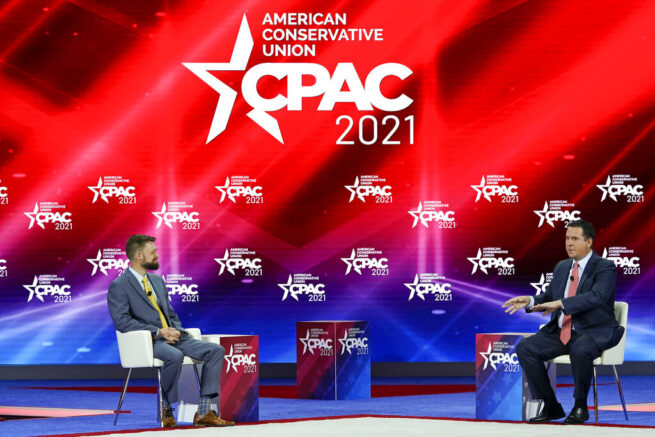 Trent England, left, of Save Our States interviews Rep. Devin Nunes, R-Calif., at the Conservative Political Action Conference (CPAC) Saturday, Feb. 27, 2021, in Orlando, Fla. (AP Photo/John Raoux)