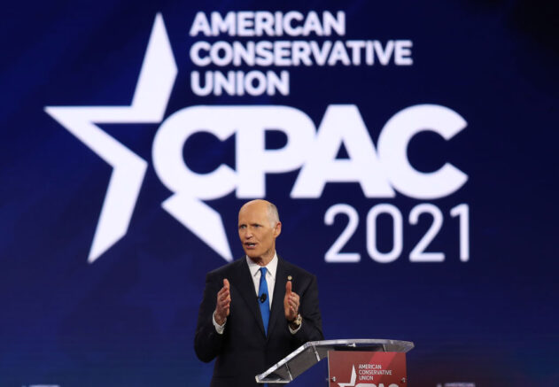  ORLANDO, FLORIDA - FEBRUARY 26: Sen. Rick Scott (R-FL) addresses the Conservative Political Action Conference being held in the Hyatt Regency on February 26, 2021 in Orlando, Florida. Begun in 1974, CPAC brings together conservative organizations, activists, and world leaders to discuss issues important to them. (Photo by Joe Raedle/Getty Images)