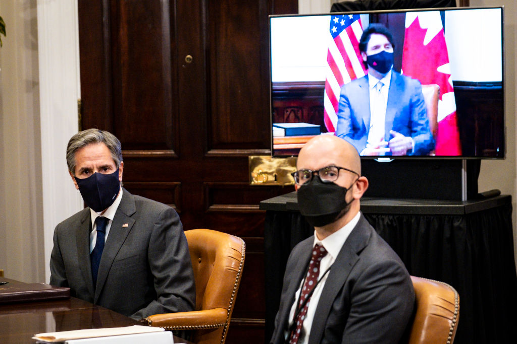 WASHINGTON, DC - FEBRUARY 23: U.S. Secretary of State Tony Blinken (L) and National Security Council Senior Director for Western Hemisphere Juan Gonzalez (R) participate in a virtual bilateral meeting with Prime Minister Justin Trudeau of Canada in the Roosevelt Room of the White House on February 23, 2021 in Washington, DC. This is Biden and Trudeau’s first bilateral meeting. (Photo by Pete Marovich-Pool/Getty Images)