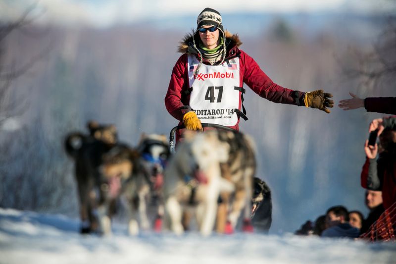 FILE PHOTO: Leifseth Ulsom of Norway heads up the first hill out of the start chute during the official restart of the Iditarod dog sled race in Willow, Alaska