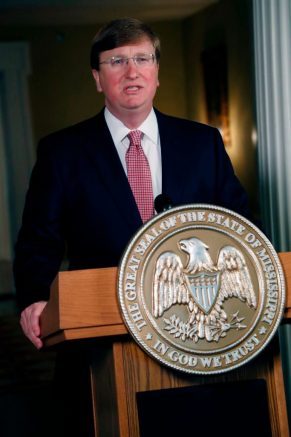 Mississippi Republican Gov. Tate Reeves delivers a televised address prior to signing a bill retiring the last state flag with the Confederate battle emblem during a ceremony at the Governor's Mansion in Jackson, Mississippi, on June 30, 2020. - Lawmakers in Mississippi voted June 28 to remove the Confederate battle standard from the state flag, after nationwide protests drew renewed attention to symbols of the United States' racist past. The measure passed with a 91-23 majority vote in the House of Representatives, triggering cheers in the Senate gallery. A few hours later, the Senate voted 37-14 for the bill. (Photo by Rogelio V. Solis / POOL / AFP) (Photo by ROGELIO V. SOLIS/POOL/AFP via Getty Images)