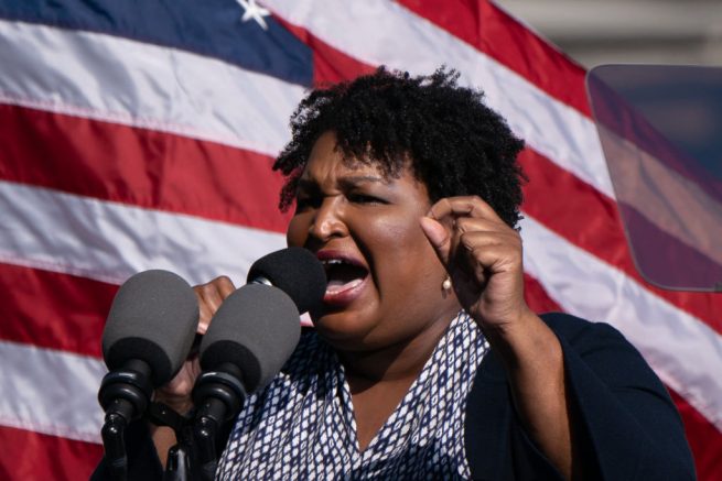 Former US Representative and voting rights activist Stacey Abrams speaks at a Get Out the Vote rally with former US President Barack Obama as he campaigns for Democratic presidential candidate former Vice President Joe Biden on November 2, 2020, in Atlanta, Georgia. (Photo by Elijah Nouvelage / AFP) (Photo by ELIJAH NOUVELAGE/AFP via Getty Images)