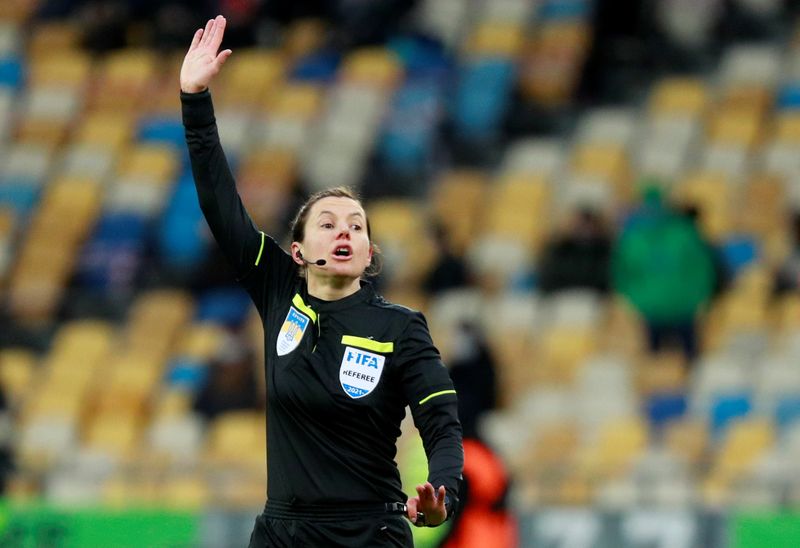 Referee Monzul gestures during a match of the Ukrainian Premier League in Kyiv