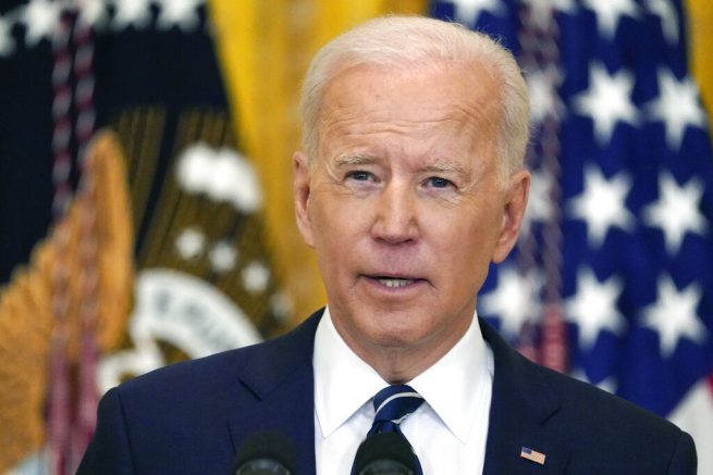 FILE - In this March 25, 2021, file photo President Joe Biden speaks during a news conference in the East Room of the White House in Washington. Biden is taking the opposite approach of the Clinton administration to help the economy. He's bulking up on debt to fuel growth, offering aid to the poor without work requirements and pulling back from globalization. (AP Photo/Evan Vucci, File)