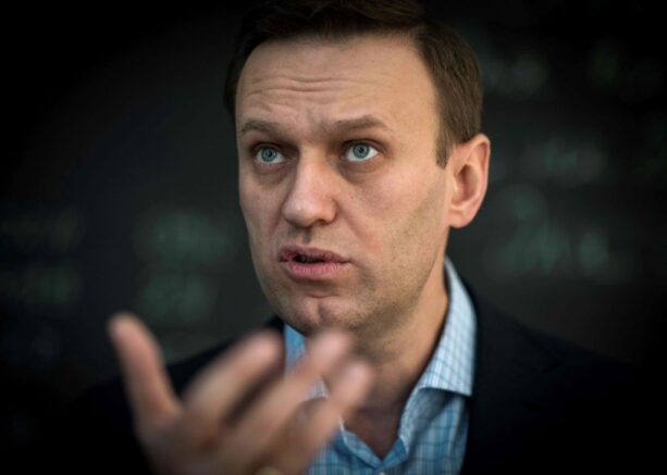 TOPSHOT - Russian opposition leader Alexei Navalny speaks during an interview with AFP at the office of his Anti-corruption Foundation (FBK) in Moscow on January 16, 2018. - The Kremlin's top critic Alexei Navalny has slammed Russia's March presidential election, in which he is barred from running, as a sham meant to "re-appoint" Vladimir Putin on his way to becoming "emperor for life". (Photo by Mladen ANTONOV / AFP) (Photo by MLADEN ANTONOV/AFP via Getty Images)