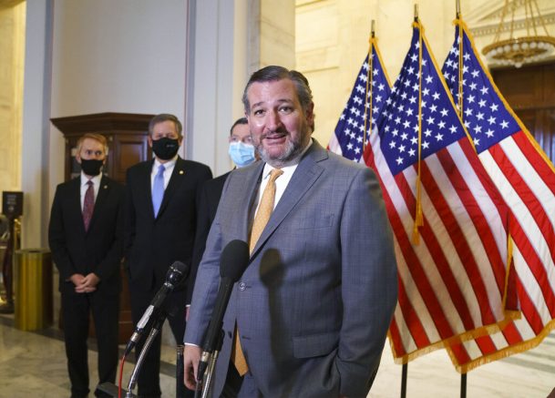 Sen. Ted Cruz, R-Texas, and other members of the Republican Conference talk to reporters following a luncheon on Capitol Hill in Washington, Wednesday, March 24, 2021. (AP Photo/J. Scott Applewhite)