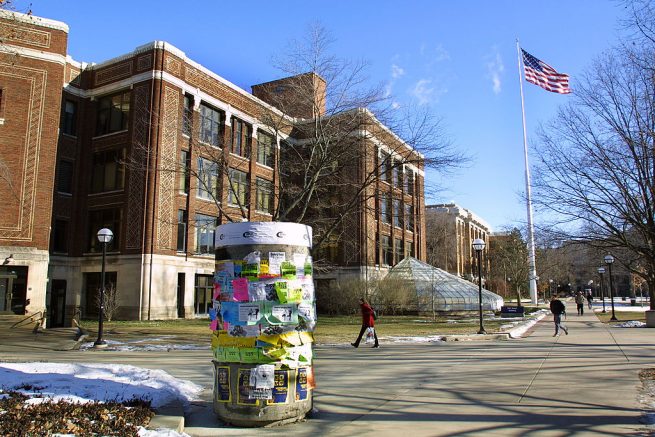 ANN ARBOR, MI - JANUARY 17: Students walk across the University of Michigan campus January 17, 2003 in Ann Arbor, Michigan. The university's admissions policy is the subject of a U.S. Supreme Court case. U.S. President George W. Bush opposes the university's affirmative action program. (Photo by Bill Pugliano/Getty Images)