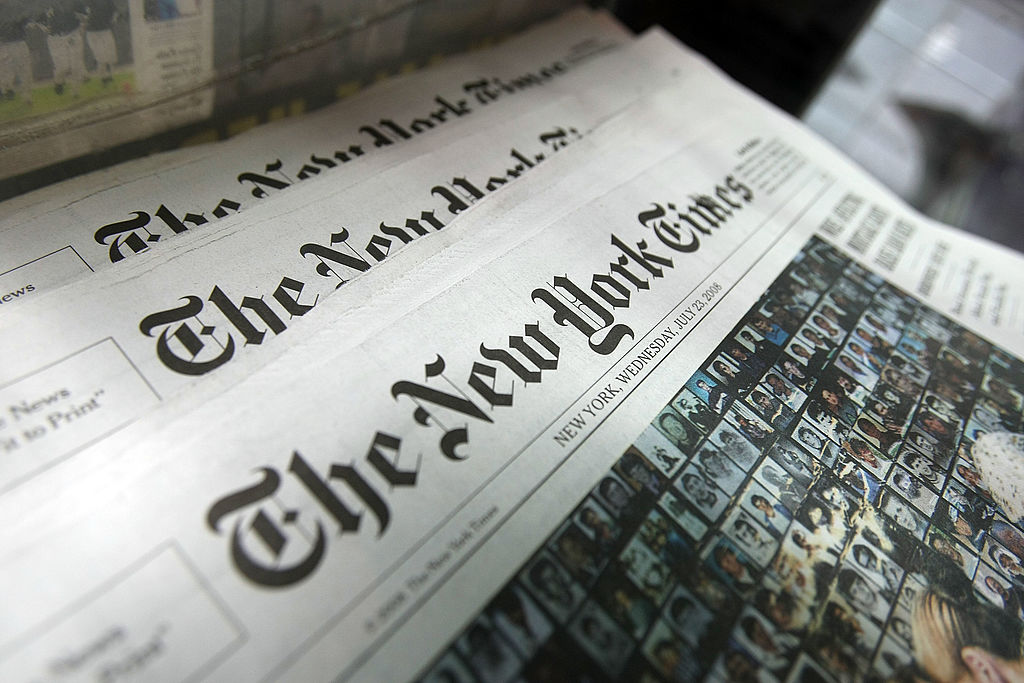 NEW YORK - JULY 23: Copies of the New York Times sit for sale in a rack July 23, 2008 in New York City. The New York broadsheet announced it posted an 82 percent decline in second quarter profits as compared to last year. It also announced it would raise its newsstand price 25 cents to a $1.50. (Photo by Mario Tama/Getty Images)