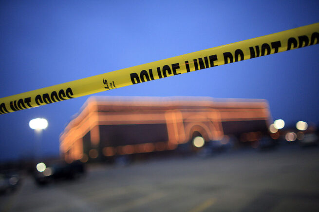 OMAHA, NE - DECEMBER 6: Police tape hangs in front of the Von Maur store at the Westroads Mall December 6, 2007 in Omaha, Nebraska. Nineteen year-old Robert A. Hawkins, armed with a semi-automatic rifle, opened fire on shoppers at the Omaha shopping mall Wednesday, killing at least nine people including himself. (Photo by Eric Thayer/Getty Images)