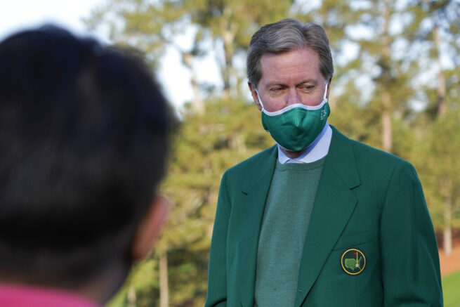 Chairman Fred Ridley waits on the first tee for the start of the final round of the Augusta National Women's Amateur golf tournament at Augusta National Golf Club, Saturday, April 3, 2021, in Augusta, Ga. (AP Photo/David J. Phillip)