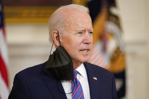 President Joe Biden responds to a question after speaking about the March jobs report in the State Dining Room of the White House, Friday, April 2, 2021, in Washington. (AP Photo/Andrew Harnik)