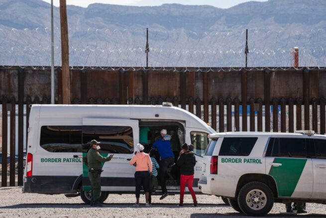 Border Patrol agents apprehend a group of migrants near downtown El Paso, Texas following the congressional border delegation visit on March 15, 2021. - President Joe Biden faced mounting pressure Monday from Republicans over his handling of a surge in migrants -- including thousands of unaccompanied children -- arriving at the US-Mexican border. Republican Congressman Kevin McCarthy of California, who leads his party in the House of Representatives, told reporters last week the "crisis at the border is spiraling out of control.""It's entirely caused by the actions of this administration," said McCarthy. (Photo by Justin Hamel / AFP) (Photo by JUSTIN HAMEL/AFP via Getty Images)
