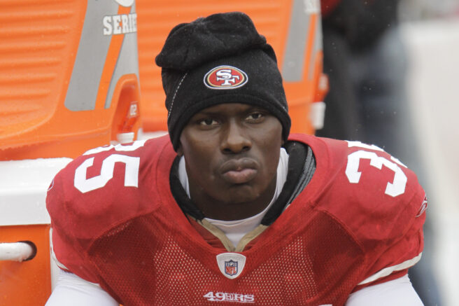 FILE - In this Oct. 17, 2010 file photo, San Francisco 49ers cornerback Phillip Adams (35) sits on the sideline during the first quarter of an NFL football game in San Francisco. A source briefed on a mass killing in South Carolina says the gunman who killed multiple people, including a prominent doctor, was the former NFL pro. The source said that Adams shot himself to death early Thursday, April 8, 2021. (AP Photo/Paul Sakuma, File)