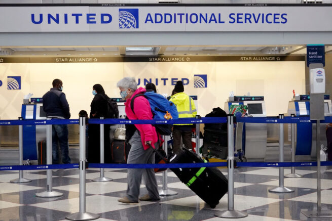CHICAGO, ILLINOIS - MARCH 16: Travelers arrive for flights at O'Hare international Airport on March 16, 2021 in Chicago, Illinois. On March 12, the TSA screened more than 1.3 million travelers, the highest number since the start of the pandemic. (Photo by Scott Olson/Getty Images)