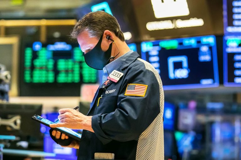 Dow rebounds 200 points led by banks and tech as market shrugs off higher tax fears