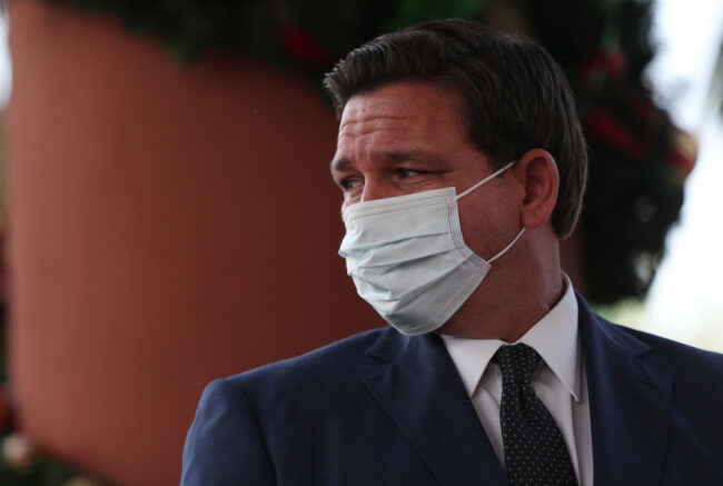 POMPANO BEACH, FLORIDA - DECEMBER 16: Florida Gov. Ron DeSantis attends a press conference where he spoke about the Pfizer-BioNtech COVID-19 vaccine at the John Knox Village Continuing Care Retirement Community on December 16, 2020 in Pompano Beach, Florida. The facility, one of the first in the country to do so, vaccinated approximately 170 people including healthcare workers and elder care people. (Photo by Joe Raedle/Getty Images)