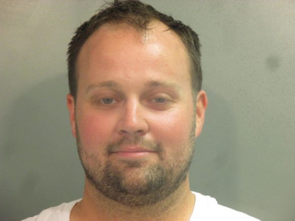  FAYETTEVILLE, AR - APRIL 29: In this handout photo provided by the Washington County Sheriff’s Office, former television personality on "19 Kids And Counting" Josh Duggar poses for a booking photo after his arrest April 29, 2021 in Fayetteville, Arkansas. Duggar was reportedly arrested by federal agents and is being detained on a federal hold. (Photo by Washington County Sheriff’s Office via Getty Images)