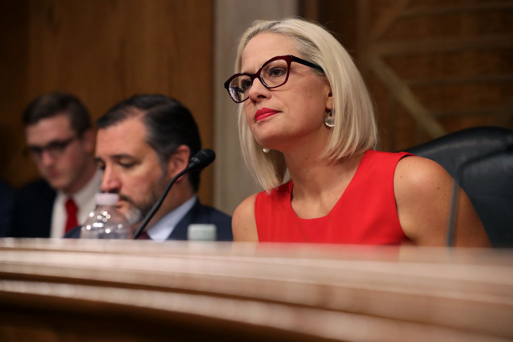 WASHINGTON, DC - MAY 14: Senate Aviation and Space Subcommittee ranking member Sen. Kyrsten Sinema questions witnesses during a hearing in the Dirksen Senate Office Building on Capitol Hill on May 14, 2019 in Washington, DC. In the wake of President Donald Trump's orders to create a military Space Force, NASA Administrator Jim Bridenstine testified about "The Emerging Space Environment: Operational, Technical, and Policy Challenges." (Photo by Chip Somodevilla/Getty Images)