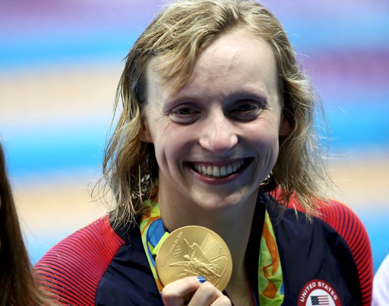 FILE PHOTO: Katie Ledecky (USA) poses with her Olympic 800m freestyle gold medal