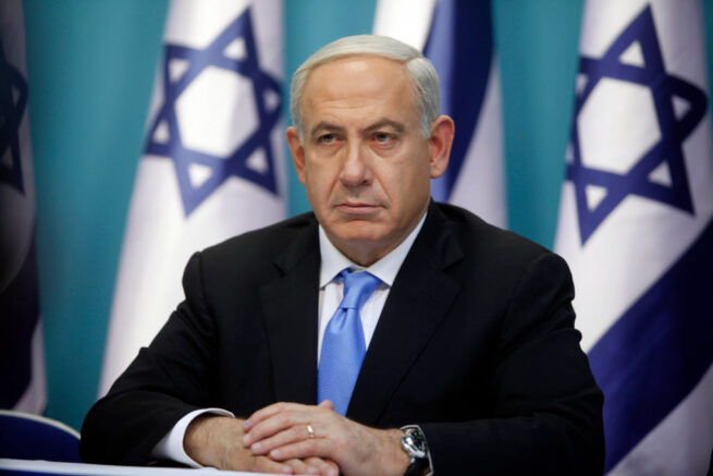 JERUSALEM, ISRAEL - NOVEMBER 21: (ISRAEL OUT) Prime Minister Benjamin Netanyahu looks on during a joint press conference with Foreign Minister Avigdor Liberman and Defence Minister Ehud Barak (not pictured), on November 21, 2012 in Jerusalem, Israel. An official ceasfire started at 9pm local time between Israel and the Palestinian Hamas movement after eight days of conflict resulting in the deaths of over 140 Palestinians, five Israelis and many hundreds injured. (Photo by Lior Mizrahi/Getty Images)