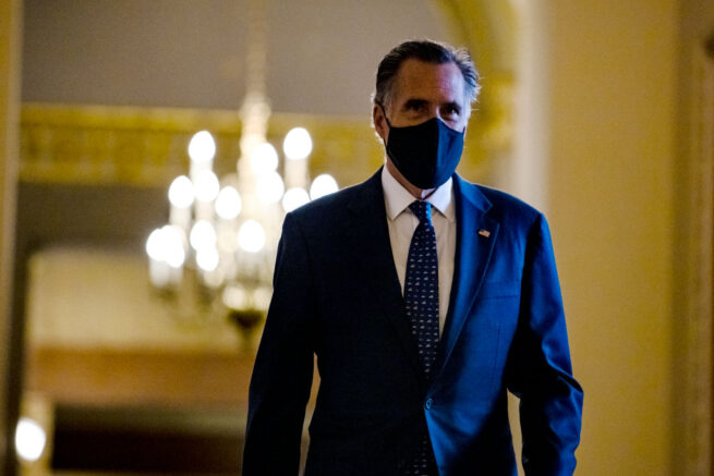 WASHINGTON, DC - JANUARY 26: Sen. Mitt Romney (R-UT) heads to the floor of the Senate on January 26, 2021 in Washington, DC. Today senators will be sworn in as the jury for the second impeachment trial of former President Donald Trump. Senate President pro tempore Patrick Leahy (D-VT) will preside over the trial in place of Supreme Court Chief Justice John Roberts. (Photo by Samuel Corum/Getty Images)