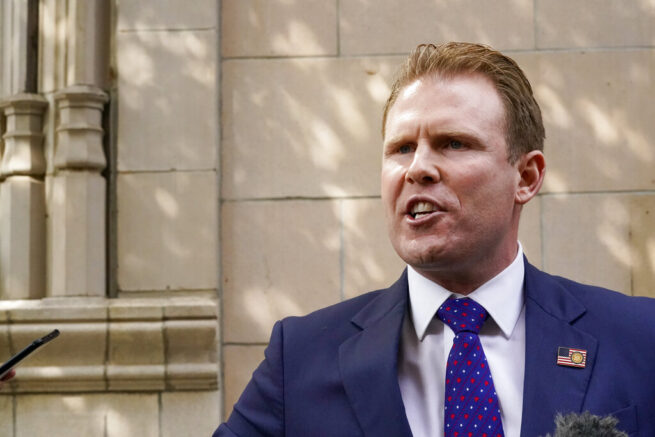  Andrew Giuliani, son of former New York Mayor Rudy Giuliani, speaks to reporters outside the building where his father lives, Wednesday, April 28, 2021, in New York. Federal agents raided Rudy Giuliani’s Manhattan home and office on Wednesday, seizing computers and cellphones in a major escalation of the Justice Department’s investigation into the business dealings of former President Donald Trump’s personal lawyer. (AP Photo/Mary Altaffer)
