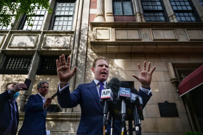  Andrew Giuliani, son of Donald Trump's former personal lawyer Rudy Giuliani, speaks to the press outside his father's apartment building in New York on April 28, 2021. - Federal investigators raided Rudy Giuliani's apartment early on April 28, as part of a probe into his dealings in Ukraine, US media reported. (Photo by Ed JONES / AFP) (Photo by ED JONES/AFP via Getty Images)