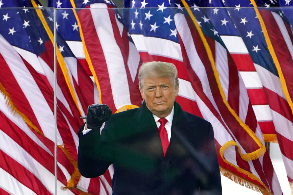 FILE - In this Jan. 6, 2021, file photo, President Donald Trump gestures as he arrives to speak at a rally in Washington. Facebook's quasi-independent oversight board last week said the company was justified in suspending Trump because of his role in inciting deadly violence at the U.S. Capitol on Jan. 6. But it told Facebook to specify how long the suspension would last, saying that its “indefinite” ban on the former president was unreasonable. (AP Photo/Jacquelyn Martin, File)