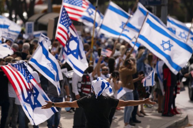 Pro-Israel demonstrators gather outside the Federal Building during a rally in support of Israel in Los Angeles, Wednesday, May 12, 2021. Israel is pressing ahead with a fierce military offensive in the Gaza Strip. The Islamic militant group Hamas showed no signs of backing down and fired hundreds of rockets at Israeli cities. (AP Photo/Jae C. Hong)