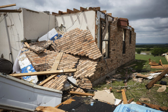 The lodge at the Barn on the Brazos wedding venue is shown after being destroyed by a tornado Tuesday, May 4, 2021, in Blum, Texas. (Yffy Yossifor/Star-Telegram via AP)