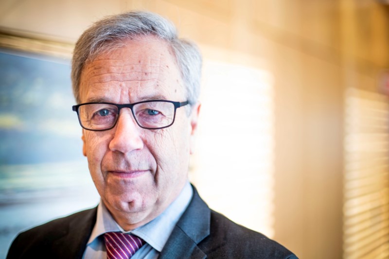 FILE PHOTO: Norway's Central Bank Governor Oeystein Olsen poses in his office at Norges Bank, Oslo