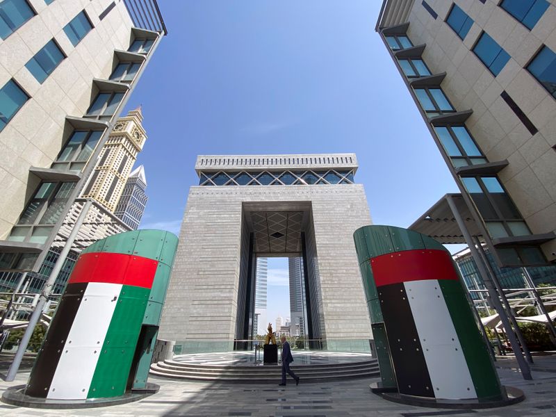 A man walks at the Dubai International Financial Centre in Dubai